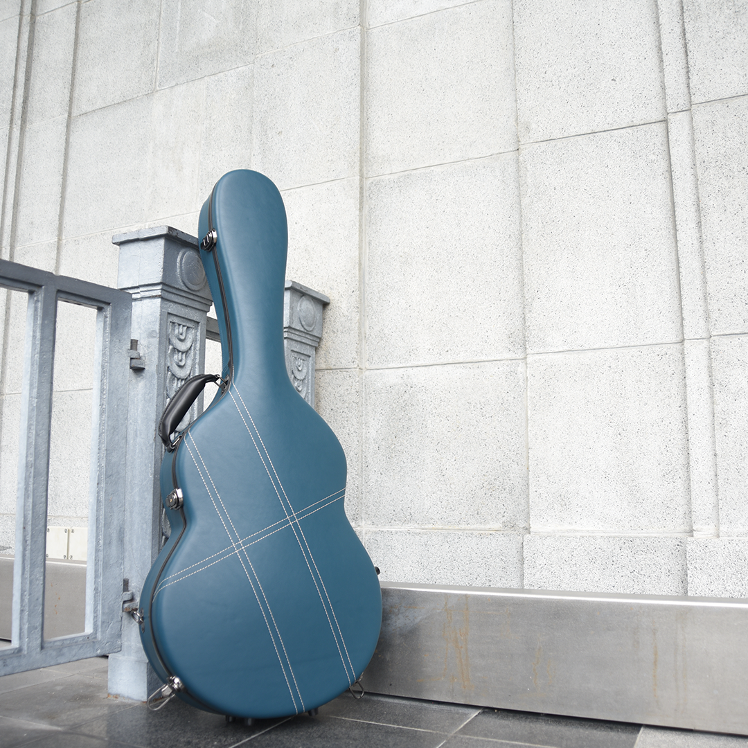 Hozen Guitars Polycarbonate Case Fully Bounded in Blue Leather