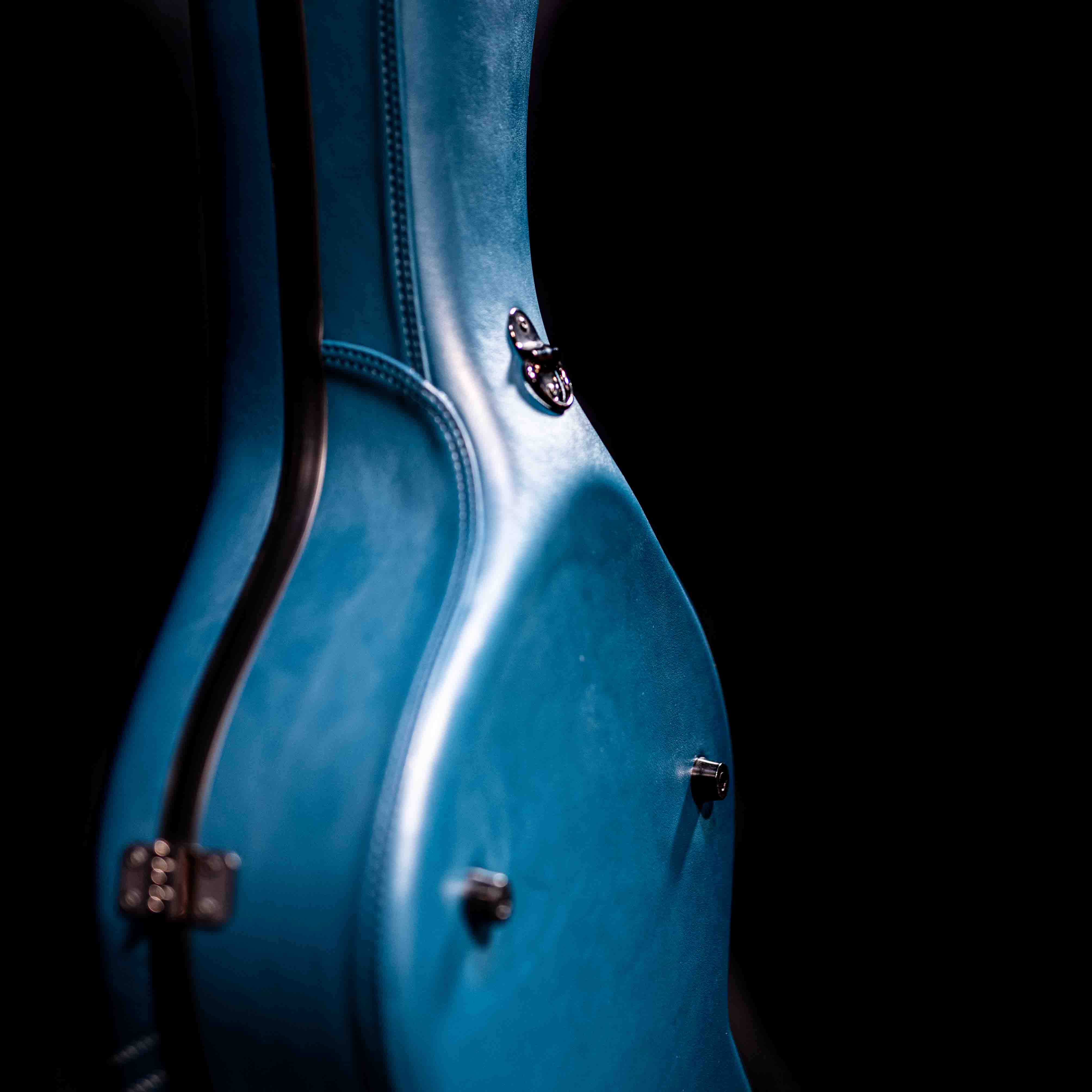 Hozen Guitars Polycarbonate Case Fully Bounded in Blue Leather